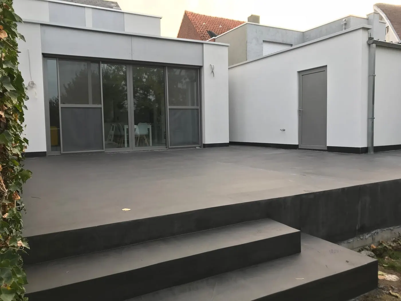 Façade insulation, render and microtopping, Asse